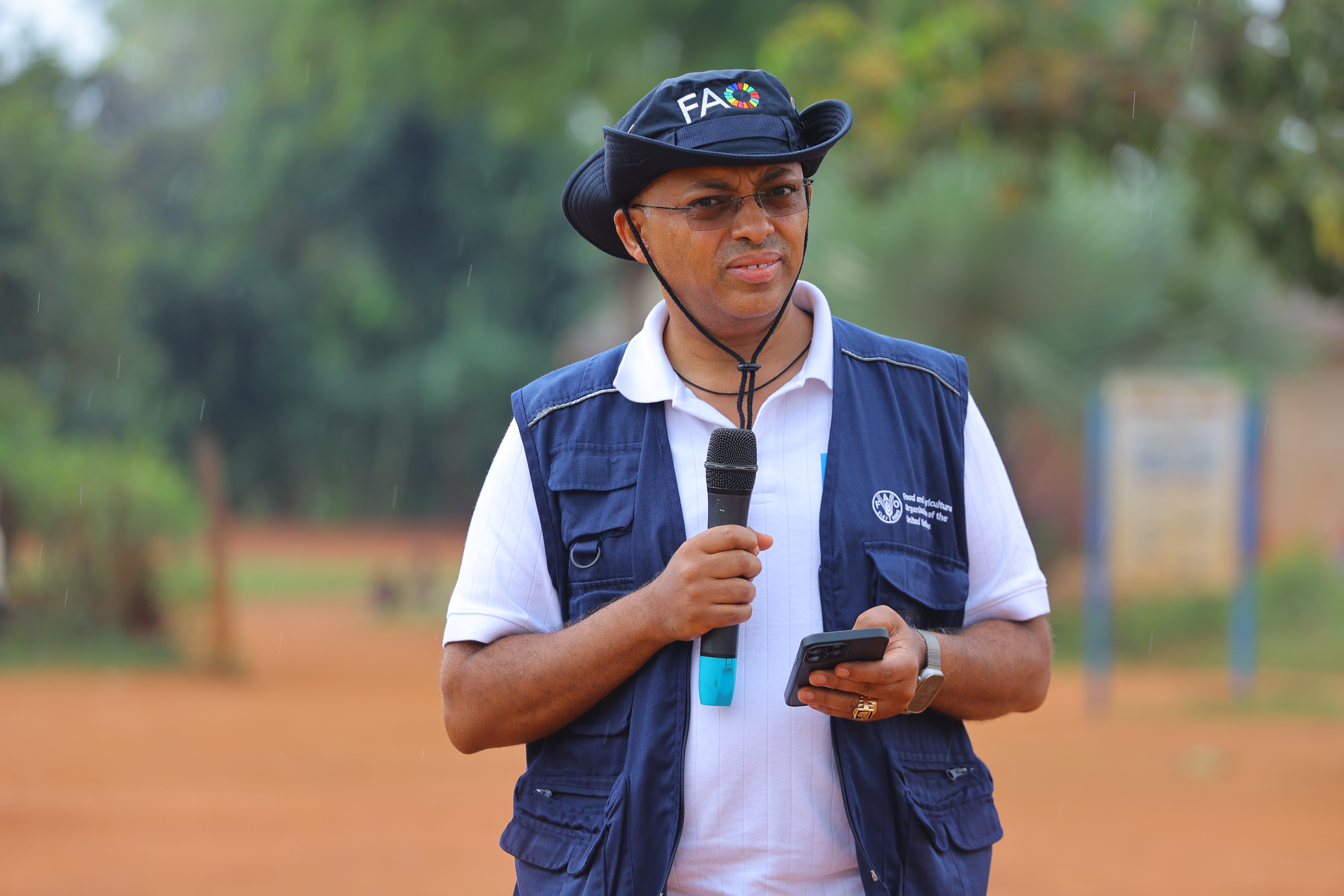The UN FAO Country Representative H.E Ezaana Kazza Speaking to People in Busana Village